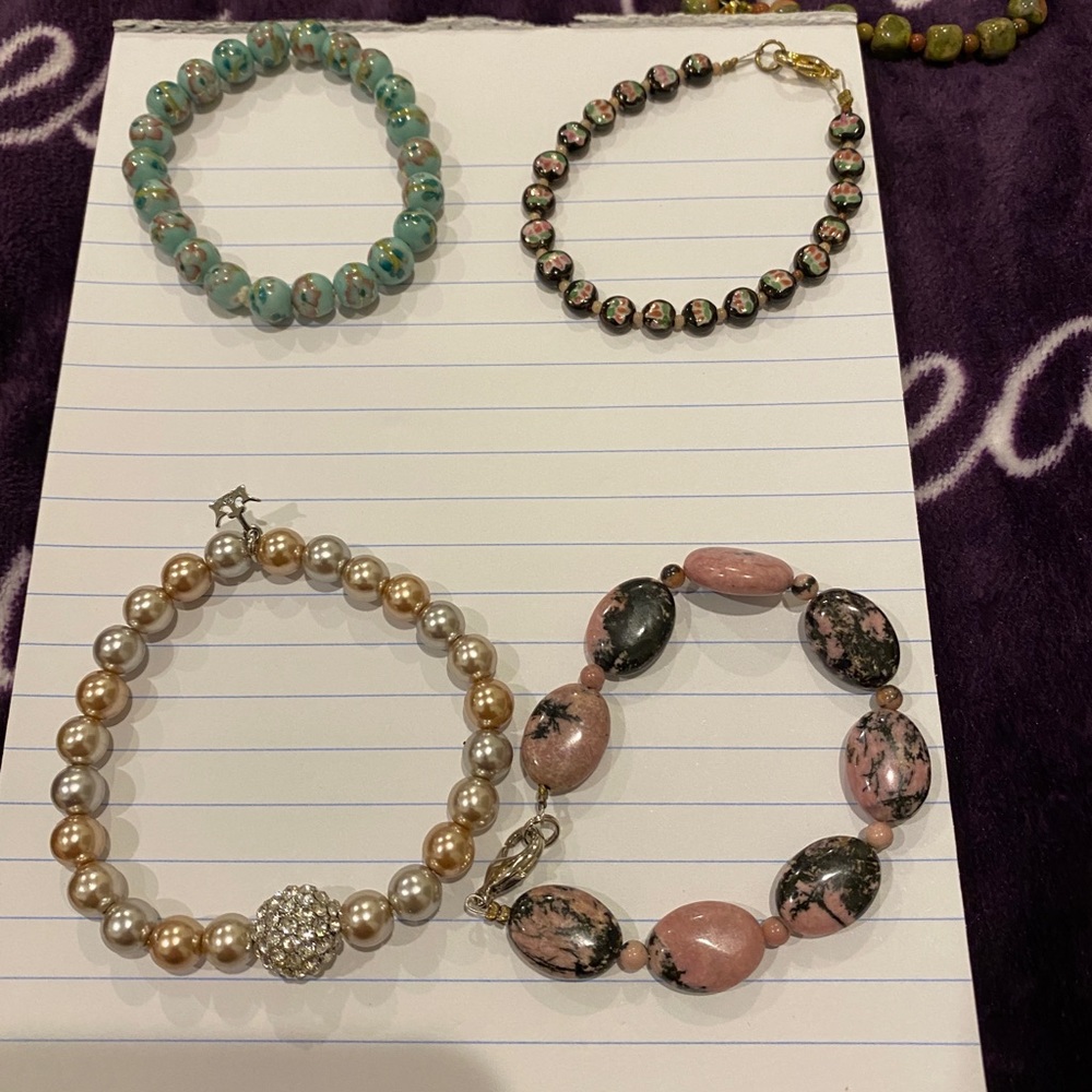 Various bracelets for sale, all beaded and custom made.
